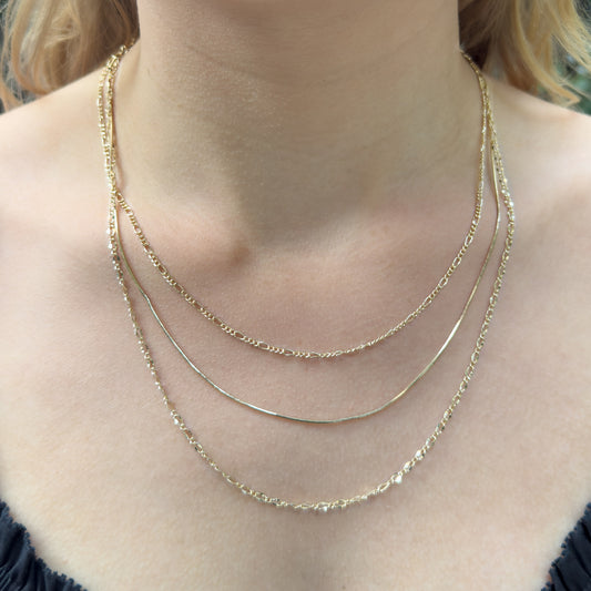 Novel 3 Layered Gold Necklace – Figaro, Snake & Link Chains